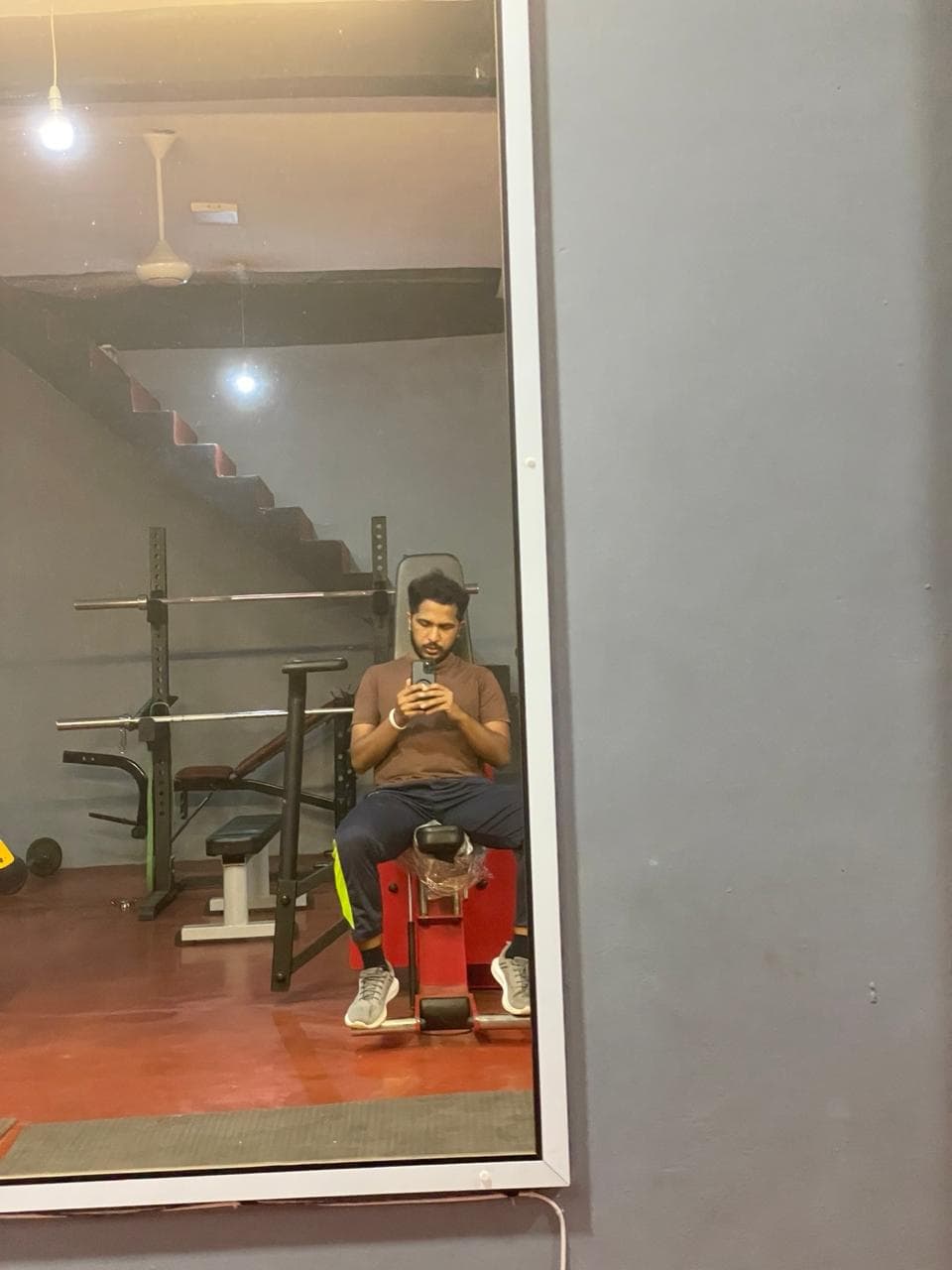 Harshana Amuwatte exercising at the gym