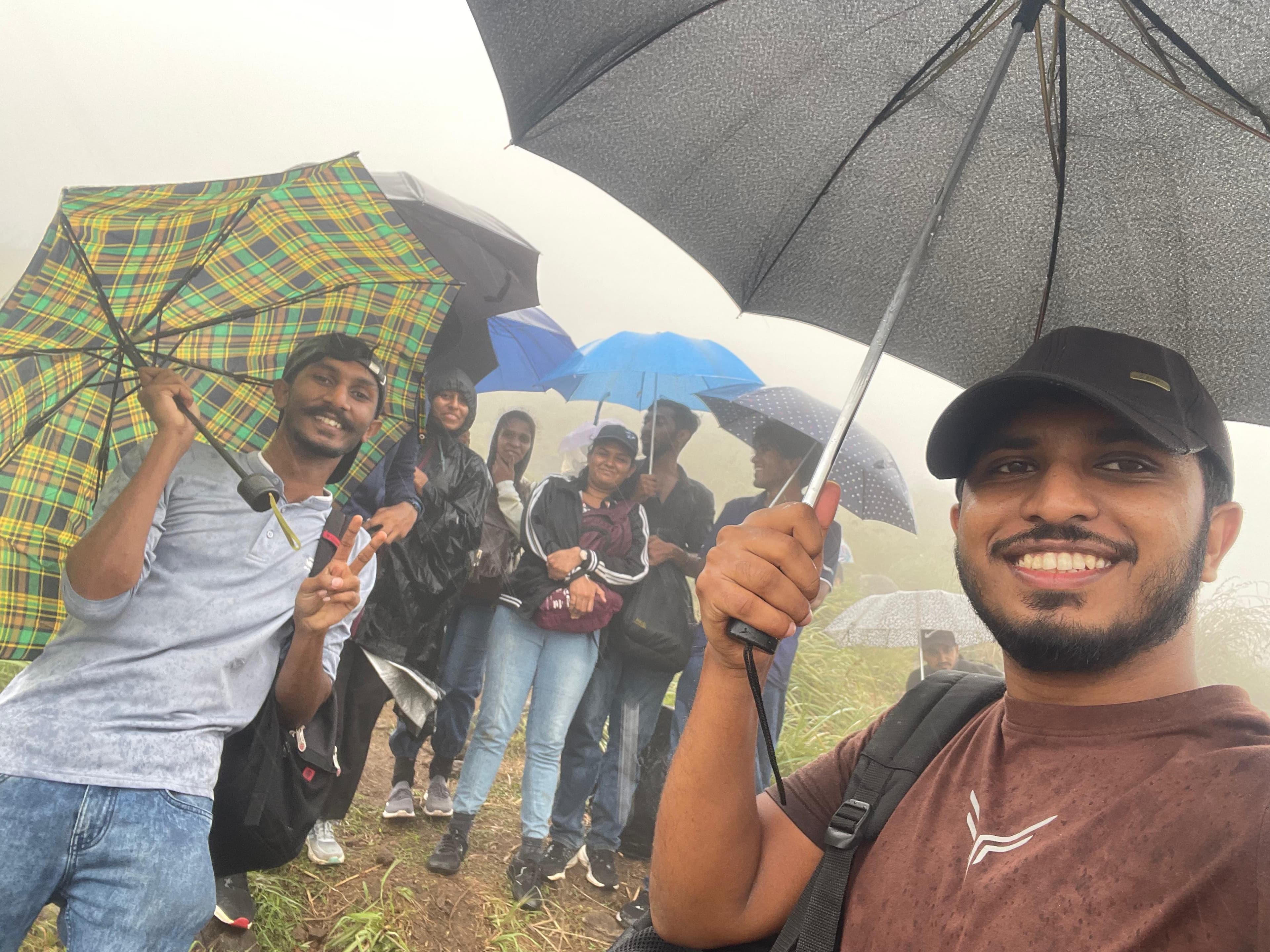 Harshana Amuwatte with university batchmates at Hanthana Mountain
